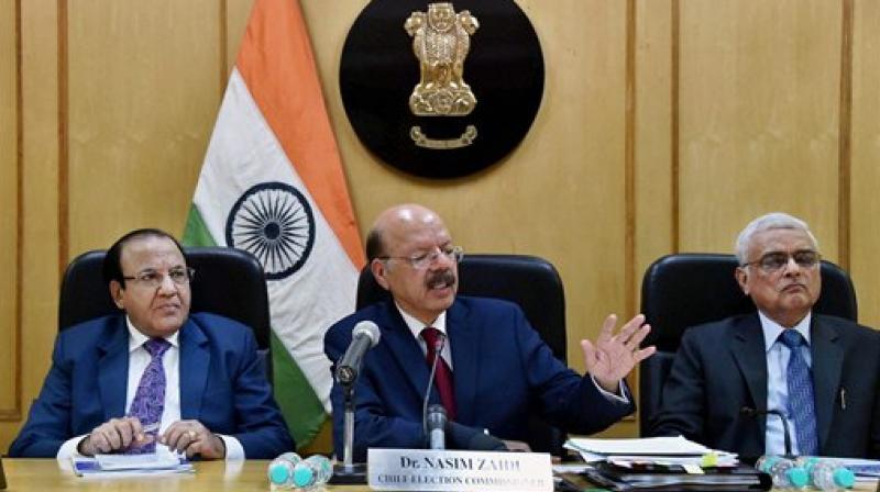 Chief Election Commissioner Nasim Zaidi, along with Election Commissioners Achal Kumar Jyoti and Om Prakash Rawat, announcing poll schedule for five states during a press conference, in New Delhi. (Photo: PTI)