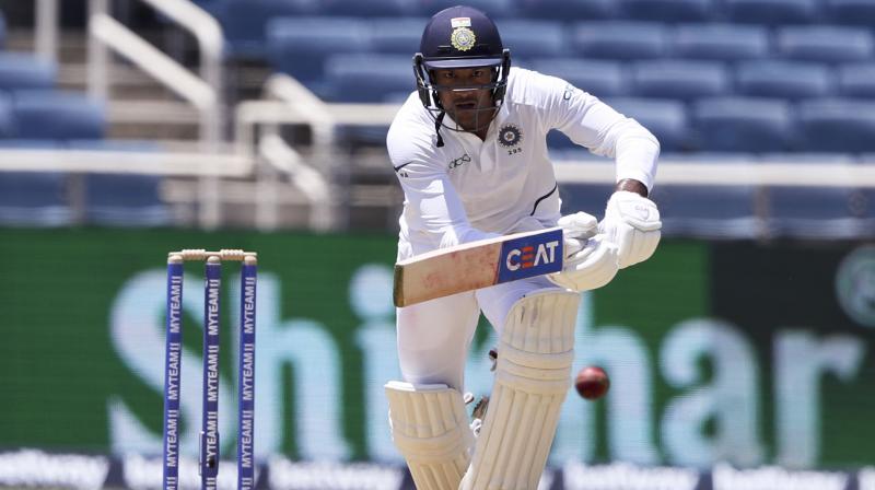 Put into bat on a tricky Sabina Park pitch, India were reduced to 46 for two in the opening session, but Virat Kohli and (76) Agarwal worked hard to rebuild the innings. (Photo: AP)