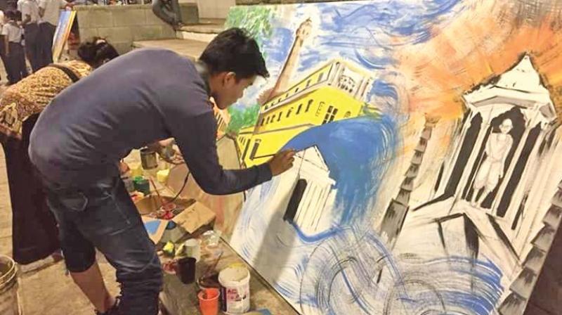 A Student participates in the painting for Puducherrys  heritage competition. (Photo: DC)