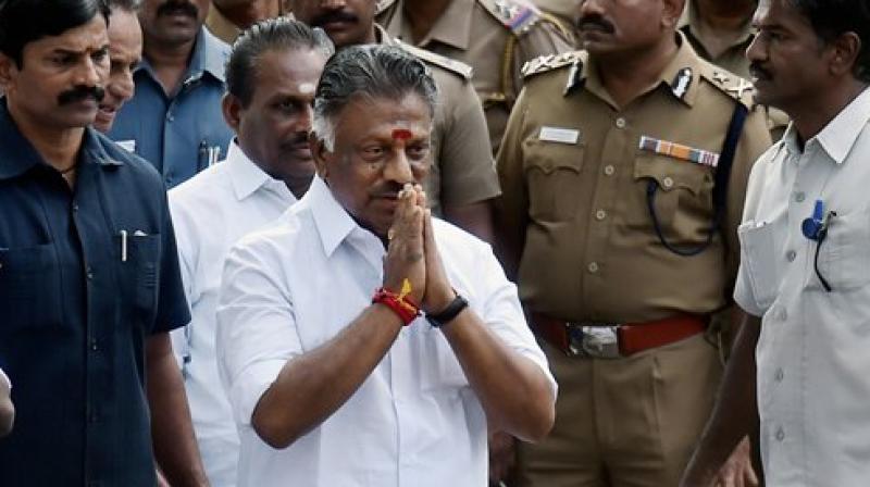 Former Chief Minister O Panneerselvam along with his supporting MLAs after the vote of confidence motion moved by chief minister Edappadi K Palanisamy passed under tumultous circumstances in the House, at State Secretariat in Chennai on Saturday. (Photo: PTI)