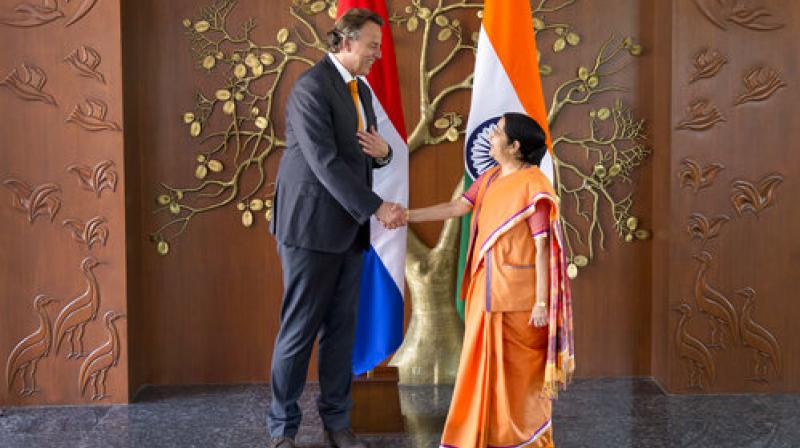Indian Foreign Minister Sushma Swaraj, right, shakes hand with her Dutch counterpart Bert Koenders in New Delhi, India, Tuesday, May 9, 2017. Koenders is on a four-day official visit to India. (Photo: AP)
