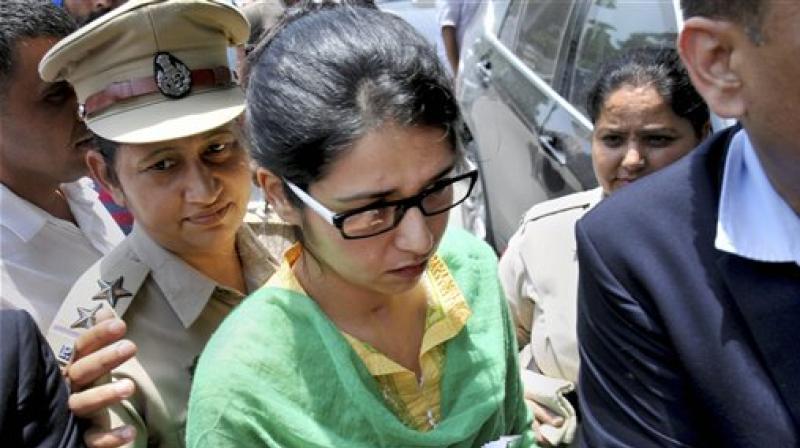 Indian national Uzma, who arrived in India from Pakistan via Attari-Wagah border, going to Delhi from Amritsar airport on Thursday. Uzma had claimed that she was forced to marry a Pakistani man and was allowed to return India by the Islamabad High Court. (Photo: PTI)