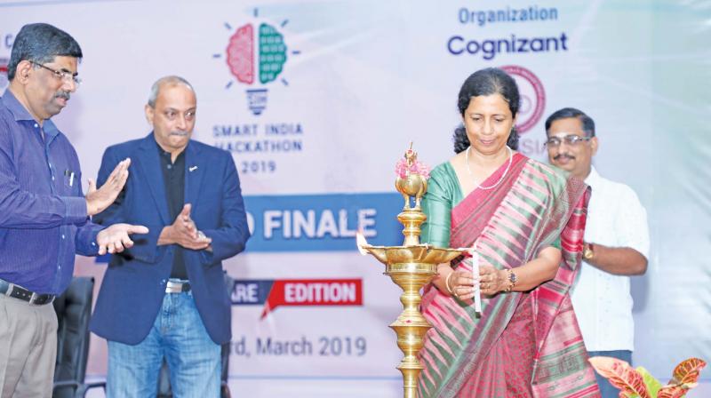Dr Mini Shaji Thomas, director of NIT-T, flanked by other dignitaries lightning the kuthuvilakku to mark the inauguration of the 36 hours grand finale of Smart India Hackathon  (SIH2019) Software Edition  at NIT-T on Saturday.	DC