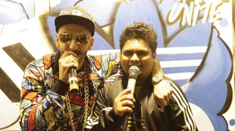 Abhishek Bhaskar with Ranveer Singh at a beatboxing event.