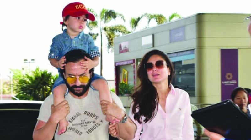 The couple arrived at the airport this morning and Taimur was more than happy to wave at the paps.