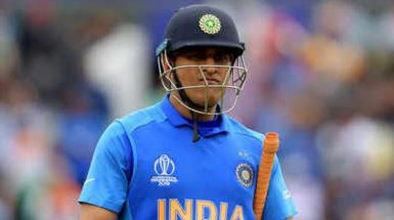 \If Dhoni doesn\t vacate his place, Dhoni would be axed from team\: reports