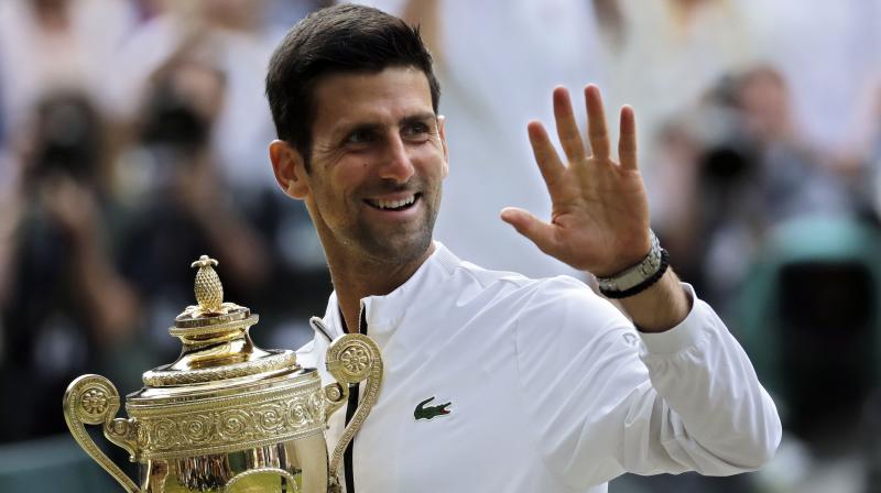 Djokovic beats Federer in five-set thriller, clinches fifth Wimbledon title