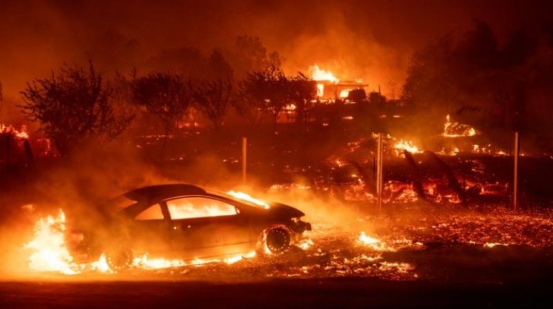 Vehicles and homes have been destroyed by the \Camp Fire\ in Paradise, California. (Photo: AFP)