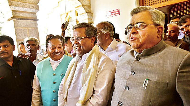 Chief Minister Siddaramaiah, BJP leader K.S. Eshwarappa and Speaker K.B. Koliwad at a meeting to discuss the Lokayuktas appointment, on Monday