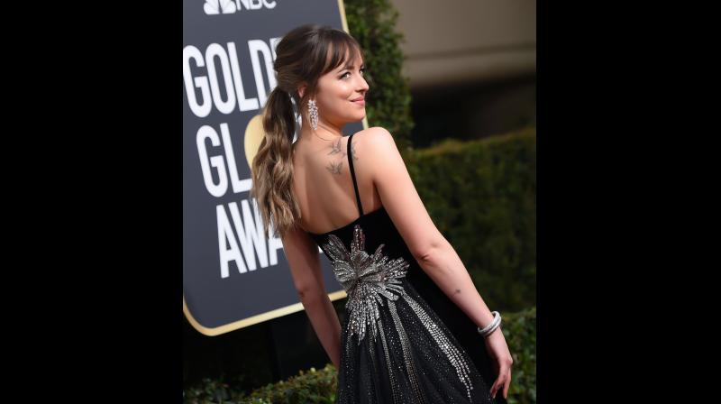 Actress Dakota Johnson sports Nirav Modi jewellery at Golden Globes Red Carpet