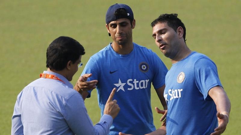 Yuvraj Singh, in an elaborated Facebook post, said, \Sourav Ganguly gave Ashu (Ashish Nehra) the nickname Popat as he talked a lot. I mean he can talk even under water!\ (Photo: AP)