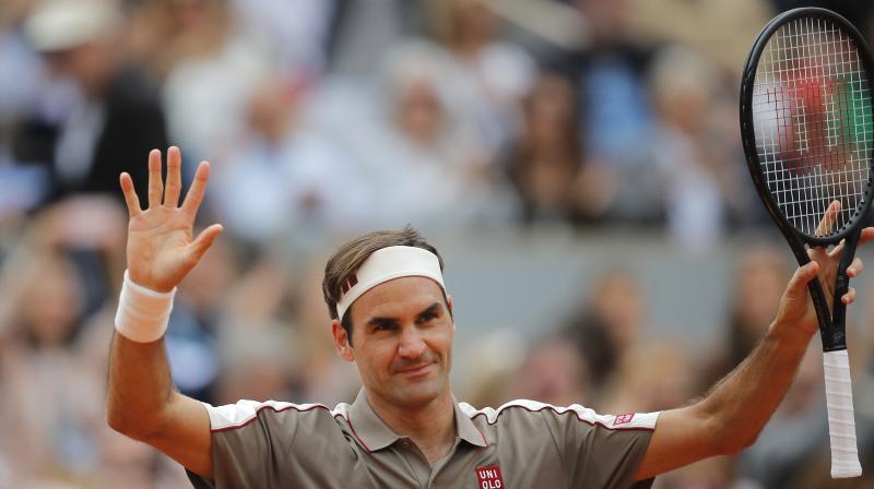French Open: Federer returns with bang, sweeps rival aside with a 6-2, 6-4, 6-4  win