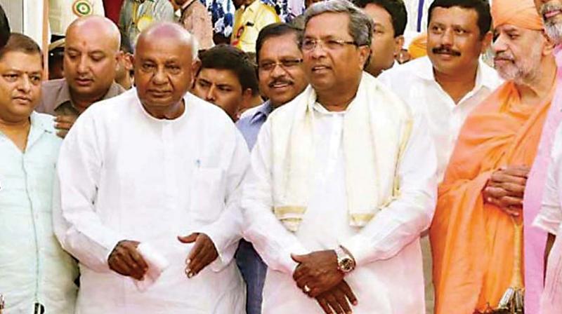 HD Deve Gowda cosies up to Congress even as son burns bridges!