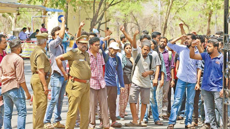 Condemning attack on the research scholar Sooraj, students of IIT-M stage a demonstration on the campus.  (Photo: DC)