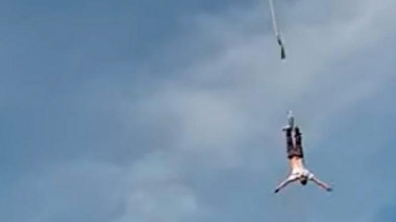 Viral video: Manâ€™s bungee jumping rope snaps mid-air, caught on camera