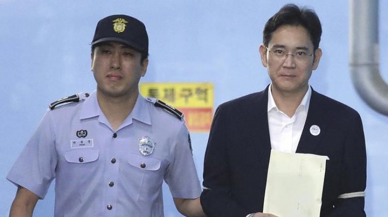 The Seoul Central District Court said Friday that Lee Jae-yong, 49, was guilty of offering bribes to Park Geun-hye when she was South Koreas president, and to Parks close friend, to get government support for efforts to cement his control over the Samsung empire. (Photo/AP)