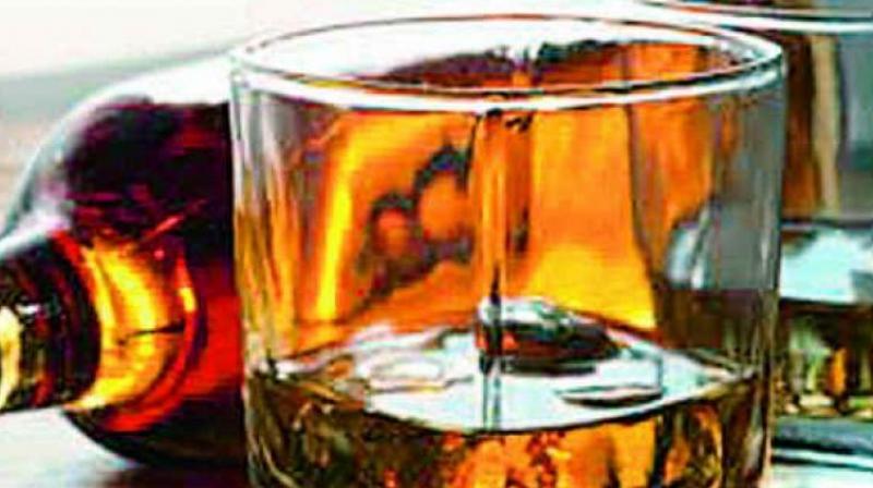 Liquor vendors seeks strike against raids