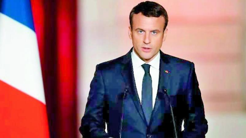 Macron urges Trump to \clarify his position\ on EU