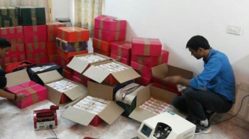 The cash were procured by the I-T deparmtment after raid on three businessmen. (Photo: Twitter)