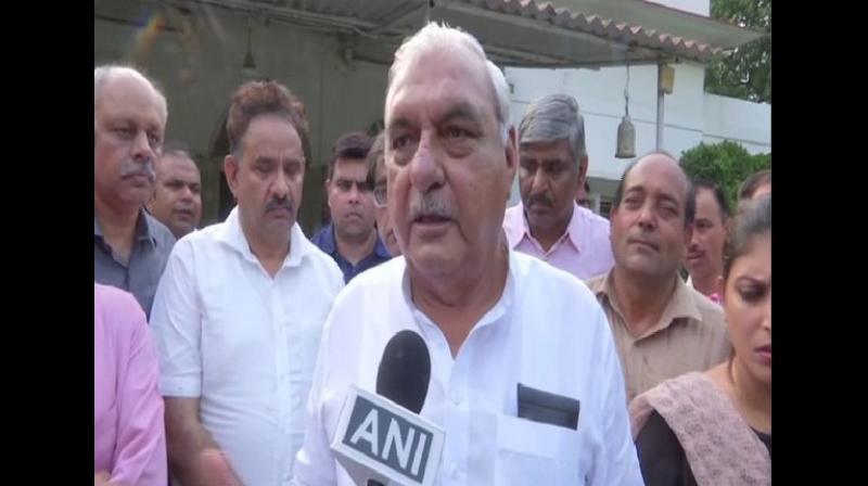 Sharma said, Hooda assured us that if his party is voted to power, it will make our pay at par with the Punjab Police. We, in turn, have assured him that the police association will vote for the Congress in the coming elections. (Photo: ANI)