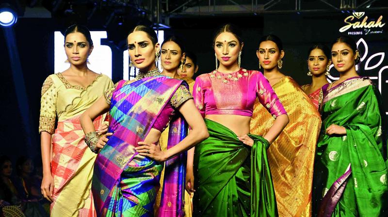 Models walk the ramp at the Fashion show in Vijayawada on Friday. (Photo: DC)