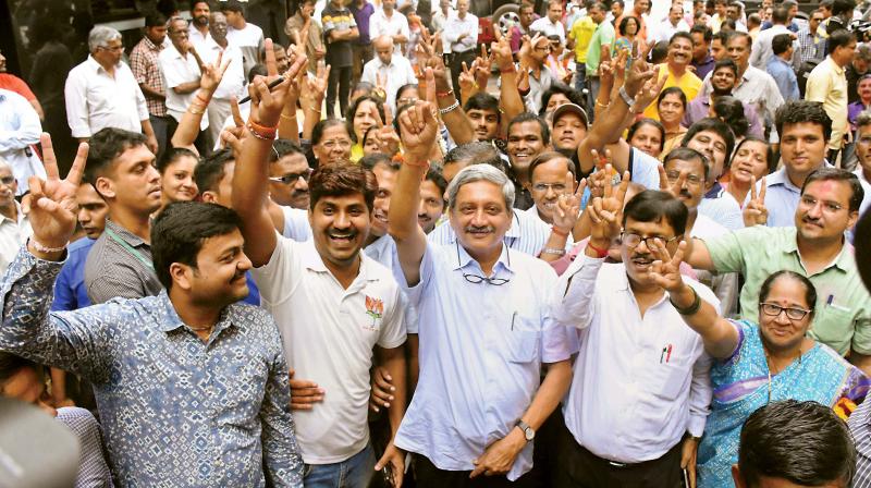 Goa Chief Minister Manohar Parrikar takes part in a victory rally after winning Panaji byelection in Goa on Monday. (Photo: PTI)