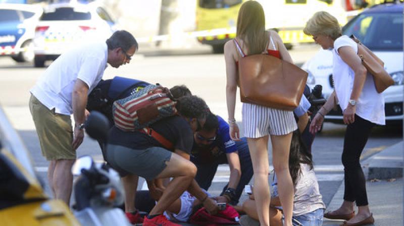 A van veered onto a promenade in central Barcelona on Thursday, killing 13 people and injuring 100. Spain authorities called it a terrorist attack and said 15 people were seriously injured.