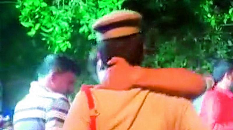 Hyderabad: Youth kisses cop, booked