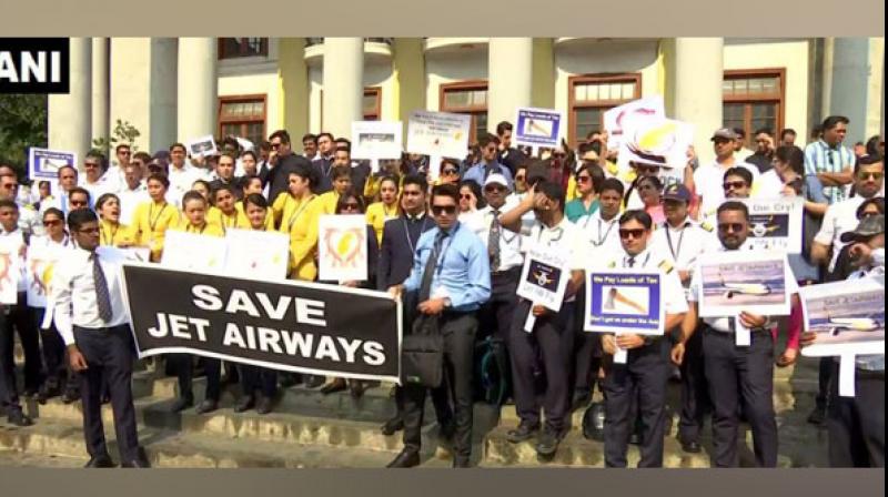 Jet Airways employees hold protest at Town Hall in Bengaluru