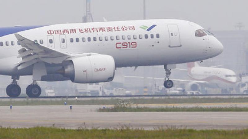 The first large Chinese-made passenger jetliner C919 took off on Friday on its maiden flight. (Photo: Aly Song/Pool Photo via AP)