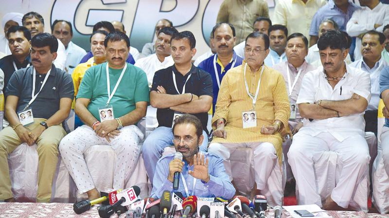 A file photo of Congress spokesperson Shakti Singh Gohil addressing the media with party MLAs from Gujarat and Karnataka Energy Minister D.K. Shivakumar at a resort on the outskirts of Bengaluru