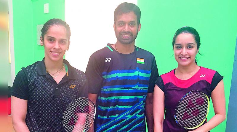 Saina Nehwal with Pullela Gopichand and Shraddha Kapoor at the Pullela Gopichand Badminton Academy
