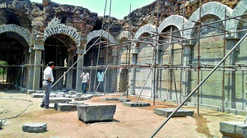 An official from the Archaeology Survey of India oversees the works being carried out at the Konda Masjid in Warangal district. (Photo:DECCAN CHRONICLE)