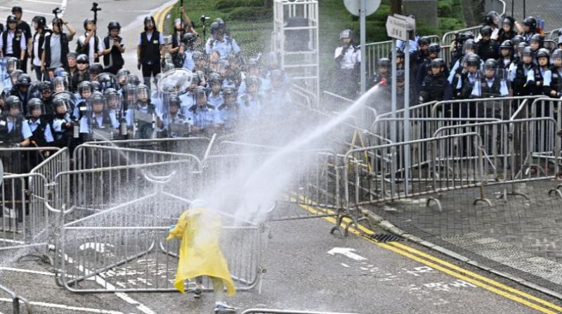 Protests grow fierce in Hong Kong over extradition law, attempt to storm Parliament
