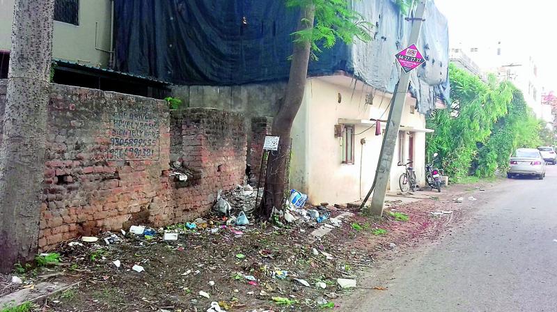 Garbage lies uncleared at Jyothi Colony, Ward 3, in the Secunderabad Cantonment in this picture provided by Ch Sai Baba. The area also has many illegal structures.