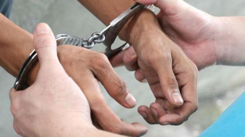 The Koramangala police have arrested two people, including a fake journalist, on charges of drug peddling and seized one kg of charas worth Rs 3 lakh from the accused.