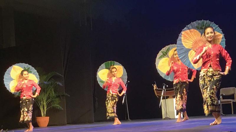 The Cambodian dancers performances included a charming group composition with coconut shells used like manjiras, a Komeng Provence choreography performed annually to a cave spirit with the boys dancing while playing mouth organs, an umbrella dance and concluding with an entertaining dance holding Cambodian and Indian flags.