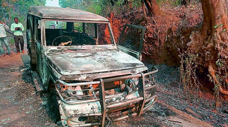 Maoists strike on poll-eve, kill poll official, torch vehicle