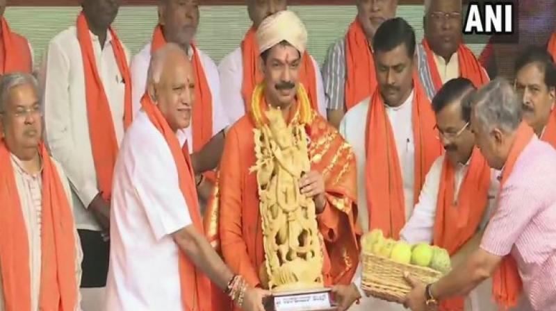 B S Yediyurappa felicitates newly appointed K\taka BJP chief Nalin Kateel