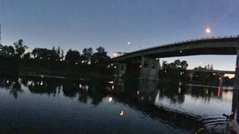 Pictures taken by Madhavan Rangaswami at Madras, Oregon show the lit up scene before the event and the darkness at totality during the eclipse.