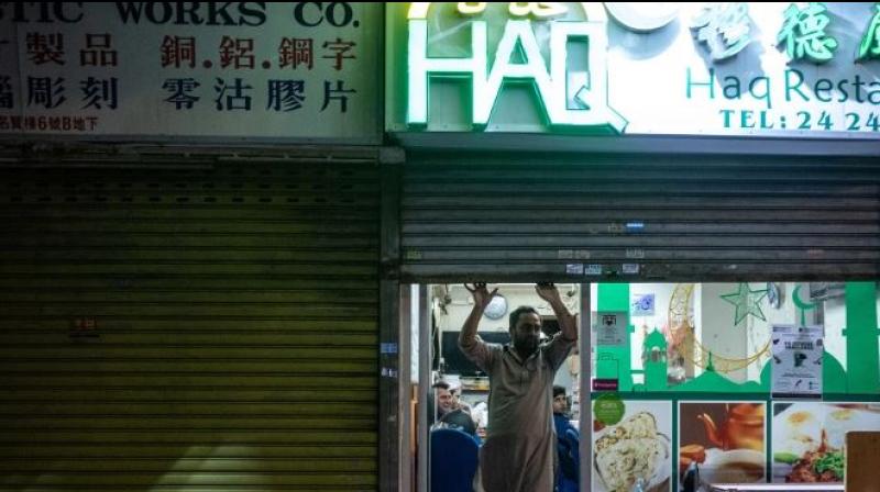 Sign of the times: China\s capital orders Arabic, Muslim symbols taken down