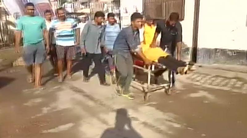 The three assailants brandishing firearms attacked RSS worker Rajesh Mishra, who is also a journalist, when he and his brother were sitting in their building material shop in Brahmanpura Chatti on Saturday morning. (Photo: ANI/Twitter)