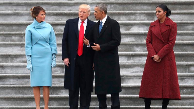 Barack and Michelle Obama indulged in some romantic public display of affection on Twitter while Melanie and Trumps timeline remained cold. (Photo: AP)