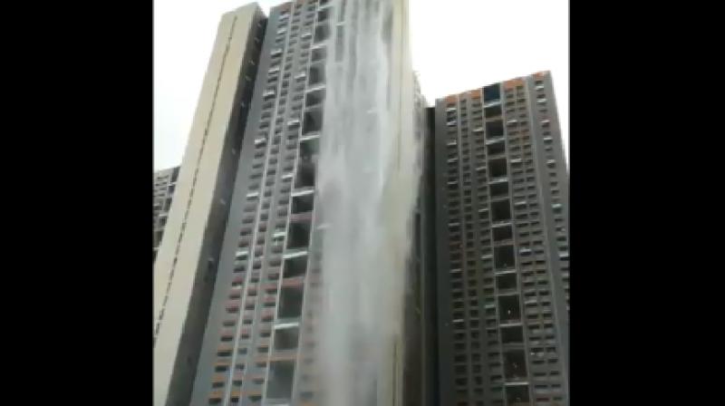 Amid heavy rains, Mumbai skyscraper turns into \waterfall\; see reactions here