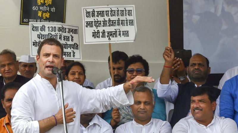 Congress President Rahul Gandhi addresses during Bharat Bandh protest called by Congress and other parties against fuel price hike and depreciation of the rupee, in New Delhi. (Photo: PTI)