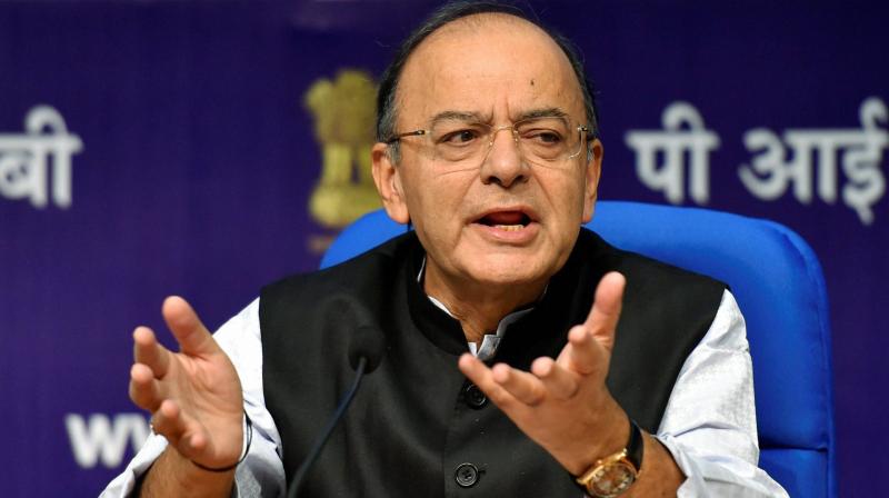 Union Minister for Finance and Corporate Affairs, Arun Jaitley addresses a Press Conference in National Media Centre in New Delhi on Tuesday. (Photo: PTI)