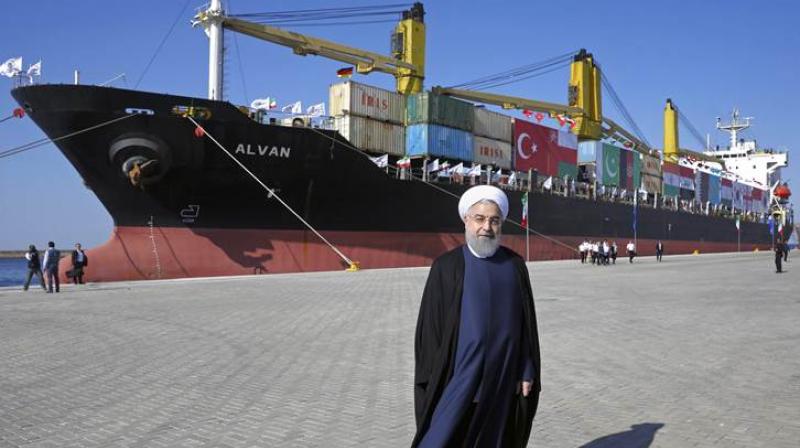 Iranian President Hassan Rouhani poses during the inauguration a newly built extension of the Chabahar Port, near the Pakistani border, in southeastern Iran on Sunday. (Photo: AP)