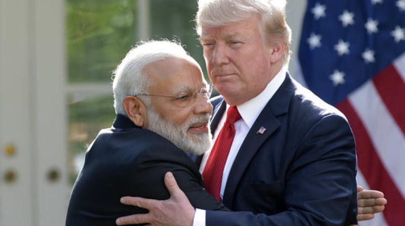 It was only on the second day of Modis trip that he swooped in for his bear hugs. (Photo: AP)