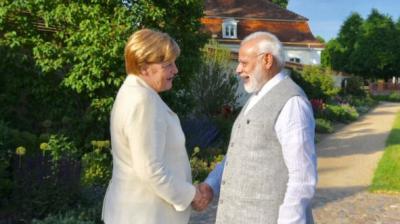 Prime Minister Narendra Modi began his four-nation tour on Monday, aimed at boosting bilateral and economic ties with Germany, Spain, Russia and France. He spoke to German Chancellor Angela Merkel, and will meet German President Frank-Walter Steinmeier. (Photo: Twitter)