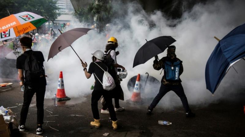 Police fire tear gas at Hong Kongers defying ban on \anti-triad\ rally